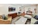 Open-concept living area with modern furnishings and a view of the dining area at 1638 Wensley Dr, Charlotte, NC 28210