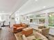 Bright living area featuring hardwood floors, neutral tones, and ample natural light at 1638 Wensley Dr, Charlotte, NC 28210
