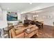 Spacious living area featuring hardwood floors and seamless transition to the dining area at 1638 Wensley Dr, Charlotte, NC 28210