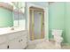 Bathroom featuring a vanity, toilet, and stand up shower with glass doors at 1750 Trellis Dr, Rock Hill, SC 29732