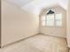 Bedroom with neutral carpet and a window, offering a comfortable and private space at 1750 Trellis Dr, Rock Hill, SC 29732