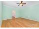 Spacious bedroom with hardwood floors and light green walls at 1750 Trellis Dr, Rock Hill, SC 29732