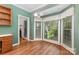 Dining area featuring hardwood floors, a chandelier, and large windows at 1750 Trellis Dr, Rock Hill, SC 29732