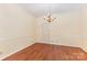 Formal dining room featuring hardwood floors and a classic chandelier at 1750 Trellis Dr, Rock Hill, SC 29732