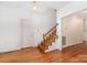 Bright foyer with hardwood floors and a staircase leading to the upper level at 1750 Trellis Dr, Rock Hill, SC 29732