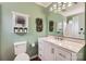Bathroom with white vanity, marbled countertop, and fresh green walls at 2009 Pinevalley Rd, Rock Hill, SC 29732