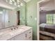 Bright bathroom featuring a white vanity and large mirror at 2009 Pinevalley Rd, Rock Hill, SC 29732