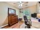 Bright home office with a traditional wood dresser and a modern computer desk at 2009 Pinevalley Rd, Rock Hill, SC 29732