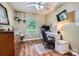 Home office with a charming wood dresser and a minimalist white desk at 2009 Pinevalley Rd, Rock Hill, SC 29732