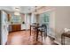 Eat-in kitchen features wood floors and a window for bright, natural light at 2009 Pinevalley Rd, Rock Hill, SC 29732