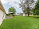 Expansive backyard featuring a gazebo, mature trees and shed for additional storage at 2040 Stratford Dr, Conover, NC 28613