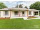 Inviting single-story home with new paint, wooden accents, and a spacious front yard at 2040 Stratford Dr, Conover, NC 28613