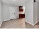 Hallway view shows access to a modern kitchen with wood cabinets and stainless steel appliances at 2040 Stratford Dr, Conover, NC 28613