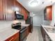 Charming kitchen featuring stainless steel appliances, wood cabinets and light countertops at 2040 Stratford Dr, Conover, NC 28613