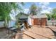 Backyard with a shed, brick exterior, and open space ready for landscaping at 2217 Tate St, Charlotte, NC 28216