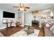 Cozy living room featuring hardwood floors and lots of light at 2217 Tate St, Charlotte, NC 28216