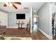 Bright living room with hardwood floors and a modern TV at 2217 Tate St, Charlotte, NC 28216