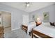 Bedroom showcasing twin beds, artwork, and natural light from windows at 2224 Hartwell Ln, Fort Mill, SC 29707