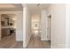 Open foyer with hardwood flooring leads to kitchen and living spaces offering a seamless flow for entertaining at 236 Mountain Island Rd # 40, Statesville, NC 28677
