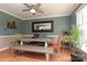 Dining area featuring a contemporary wood table and a decorative mirror at 2443 Knickerbocker Dr, Charlotte, NC 28212