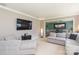 Bright living area featuring a sectional sofa and open view to the dining room at 2443 Knickerbocker Dr, Charlotte, NC 28212
