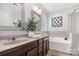 Beautiful bathroom with double vanity, soaking tub and tile surround at 2548 Chasewater Dr, Fort Mill, SC 29707