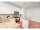 Modern kitchen with granite countertops, stainless steel appliances, and tile backsplash at 2548 Chasewater Dr, Fort Mill, SC 29707