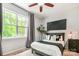 Modern bedroom with neutral colors, stylish accents, and natural light at 2548 Chasewater Dr, Indian Land, SC 29707