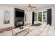 Bright living room featuring a fireplace and large windows at 2548 Chasewater Dr, Indian Land, SC 29707