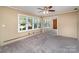 Bedroom featuring neutral walls, carpeting, and a ceiling fan at 300 Caldwell St, Kannapolis, NC 28083