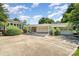 Expansive yard with long driveway, single story home with attached garage and brick construction at 300 Caldwell St, Kannapolis, NC 28083