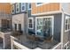 Relaxing back porch with stylish outdoor furniture and wrought iron railings at 3321 Treble Ct, Charlotte, NC 28262