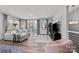 Bright living room with large windows, hardwood floors, and comfortable seating at 3321 Treble Ct, Charlotte, NC 28262