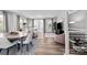Open living and dining area with hardwood floors and modern furniture at 3321 Treble Ct, Charlotte, NC 28262