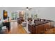 Spacious living room featuring a fireplace, hardwood flooring, and lots of natural light at 3506 Cardiff Ln, Matthews, NC 28104
