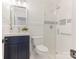 Bathroom featuring modern vanity, glass-enclosed shower and updated fixtures at 406 Wilcrest Dr, Matthews, NC 28105