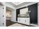 Elegant foyer featuring white wainscoting, dark accent wall, and stylish decor at 407 Newstyle Way, Gastonia, NC 28056