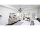 Bright main bedroom with decorative chandelier and adjoined sitting room at 407 Newstyle Way, Gastonia, NC 28056