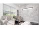 Cozy sitting room with marble accent wall, neutral paint, and view to outdoors at 407 Newstyle Way, Gastonia, NC 28056