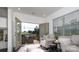 Inviting sitting room with serene backyard view, neutral paint, and comfortable seating at 407 Newstyle Way, Gastonia, NC 28056