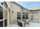 Outdoor patio space provides an area to relax and entertain with neutral colors at 409 Newstyle Way, Gastonia, NC 28056
