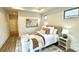 Bright bedroom features hardwood floors, neutral color palette and natural light at 409 Newstyle Way, Gastonia, NC 28056