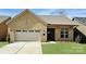 Beautiful brick home with a two-car garage and well-manicured lawn is move-in ready! at 409 Newstyle Way, Gastonia, NC 28056