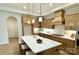 Modern kitchen features stainless steel appliances, hardwood floors and quartz countertops at 409 Newstyle Way, Gastonia, NC 28056