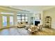 Bright living room boasts a fireplace, large windows, and hardwood floors at 409 Newstyle Way, Gastonia, NC 28056