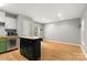 Bright kitchen area with a movable island and recessed lighting at 410 Glass Ct, Kannapolis, NC 28081