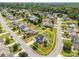 An aerial view of a charming single-Gathering home with a well-manicured lawn in a tranquil neighborhood setting at 423 Courtland Ct, Kannapolis, NC 28081
