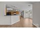 Open kitchen with wood cabinets, white walls and modern appliances at 423 Courtland Ct, Kannapolis, NC 28081