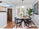 Chic dining area featuring a round table, modern lighting, and stylish accents at 4329 Hathaway St # D, Charlotte, NC 28211