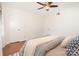 Inviting bedroom with neutral tones, hardwood floors, a ceiling fan, and closet space at 4329 Hathaway St # D, Charlotte, NC 28211